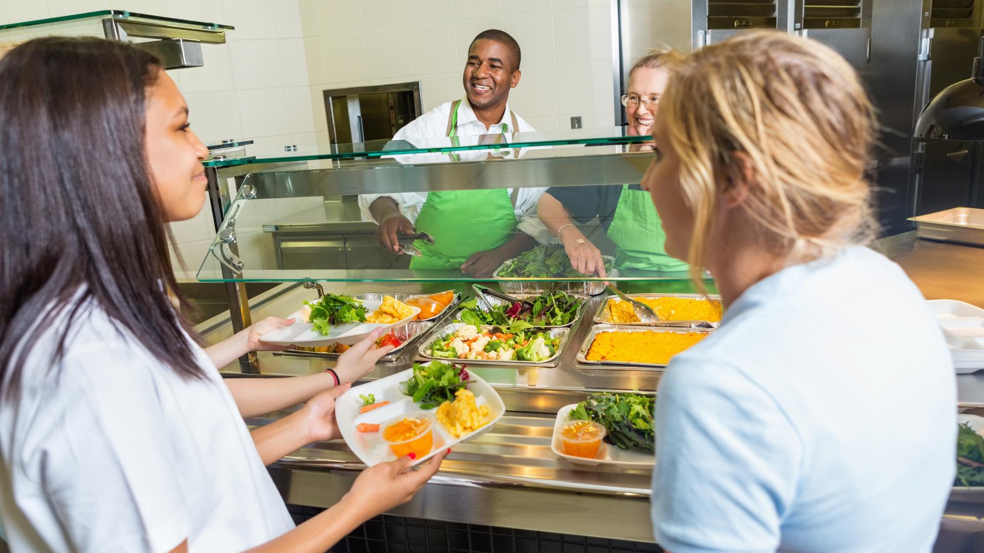 Students being served in a university canteen