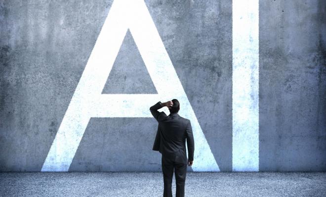 Baffled man looking at AI symbol