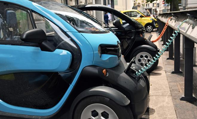 A line of electric vehicles charging